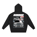 E36 and E30 car graphic on an oversized black hoodie